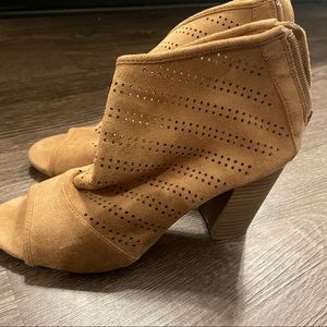 Brown woman’s shoes with zip back